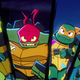 The Ninja Turtles in Rise of the Teenage Mutant Ninja Turtles: The Movie.